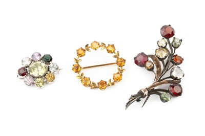 Lot 71 - A 9ct gold and citrine circlet brooch, of...