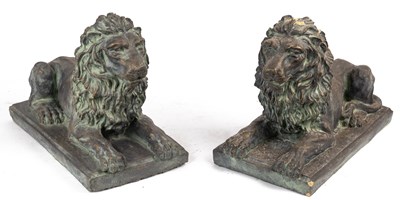 Lot 1257 - A pair of lion ornaments