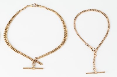 Lot 215 - A 9ct gold curb-link Albert chain, with T-bar...