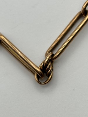 Lot 69 - A 9ct gold Albert chain, composed of alternate...