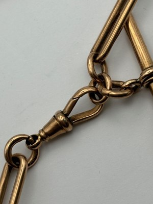 Lot 69 - A 9ct gold Albert chain, composed of alternate...