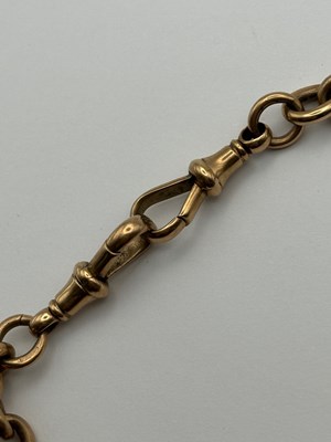 Lot 69 - A 9ct gold Albert chain, composed of alternate...