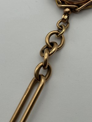 Lot 69 - A 9ct gold Albert chain, composed of alternate...