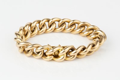 Lot 196 - A curb-link bracelet, the clasp stamped '15ct',...