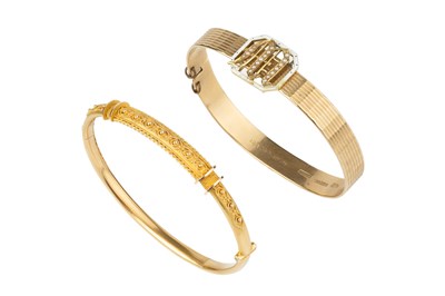 Lot 15 - A late Victorian 15ct gold bangle, of hinged...