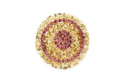 Lot 153 - A stone set panel brooch, the shaped circular...