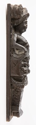 Lot 4 - An early 17th century carved oak caryatid term...