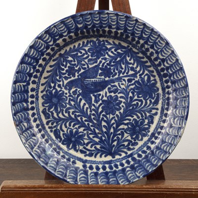 Lot 470 - Blue pottery charger Portuguese, painted with...