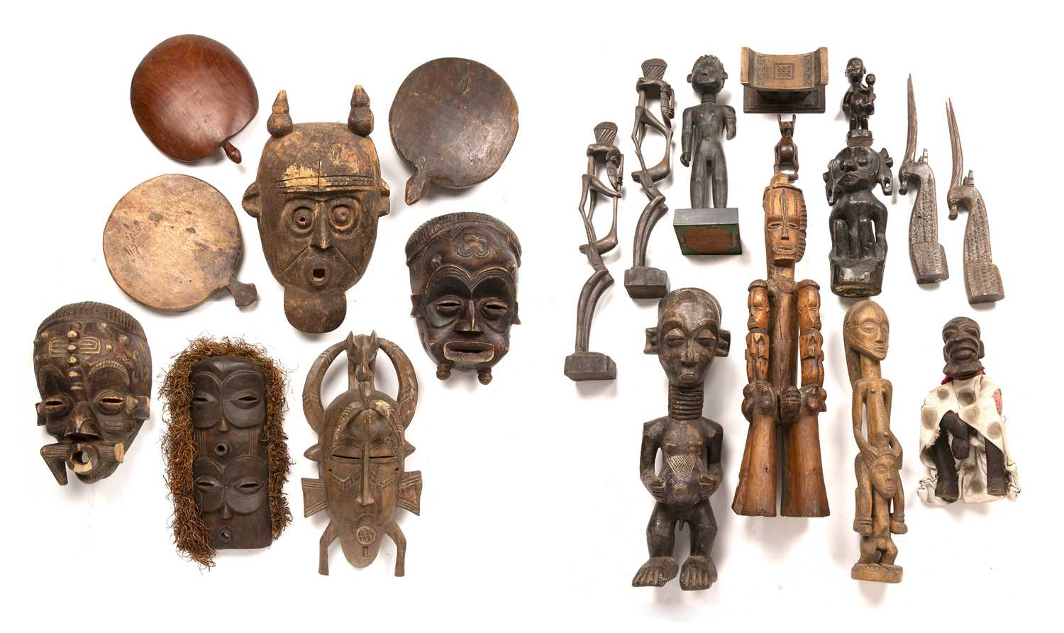 Lot 108 - African tribal art to include mask and Igbo...
