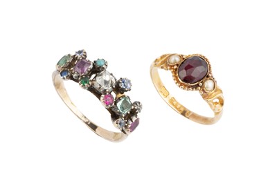 Lot 37 - A vari gem set dress ring, the central cushion-...