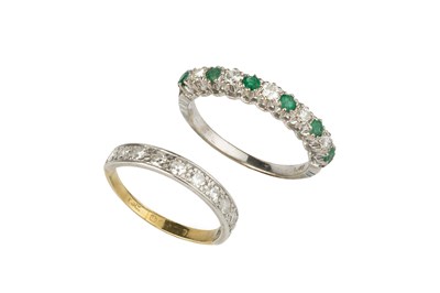 Lot 109 - An emerald and diamond half hoop ring, white...