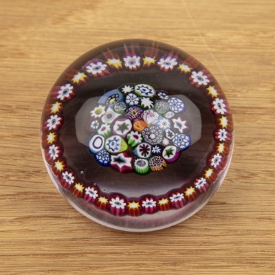 Lot 319 - Paul Ysart millefiori glass paperweight, with...