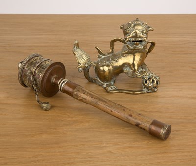 Lot 453 - Prayer wheel and a brass temple dog Tibetan...