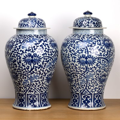 Lot 62 - Pair of blue and white vases and covers...