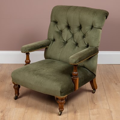 Lot 502 - A Holland & Sons green draylon open armchair