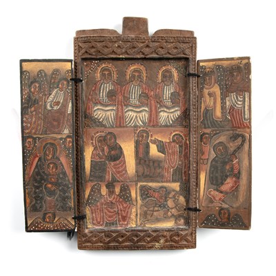 Lot 515 - An antique Ethiopian Orthodox tryptych icon in...