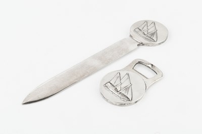 Lot 283 - A silver plated letter opener and bottle...