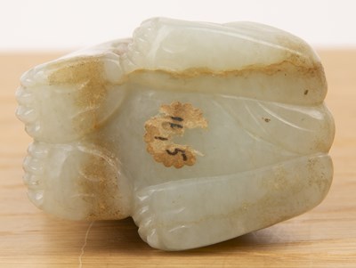 Lot 152 - Mythical pale green jade model of a beast...