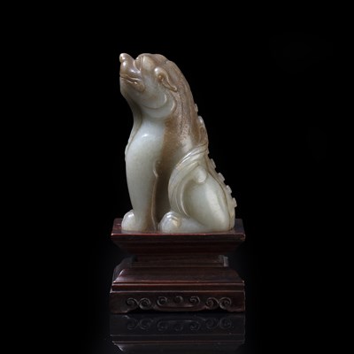 Lot 152 - Mythical pale green jade model of a beast...