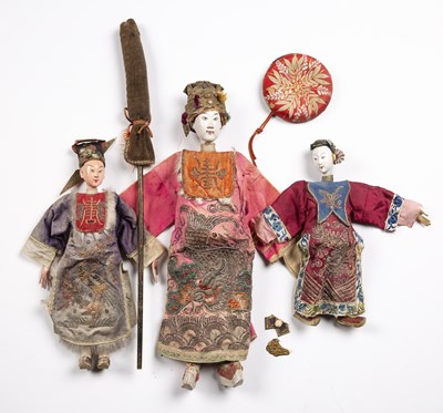 Lot 368 - Three wooden dolls Chinese to include a female...