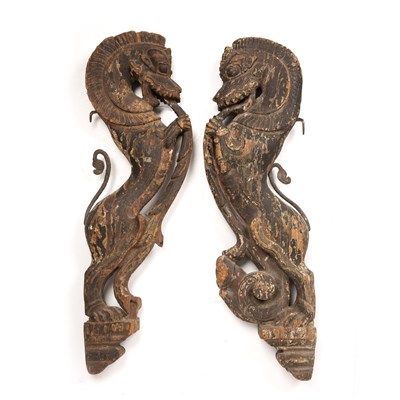 Lot 52 - A pair of antique eastern carved and painted...