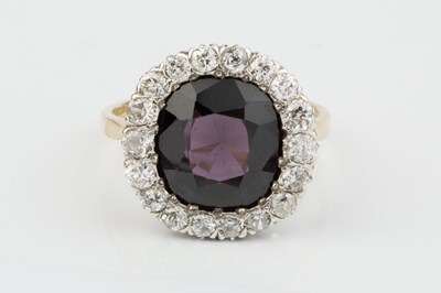 Lot 281 - A diamond set cluster ring, centred with a...