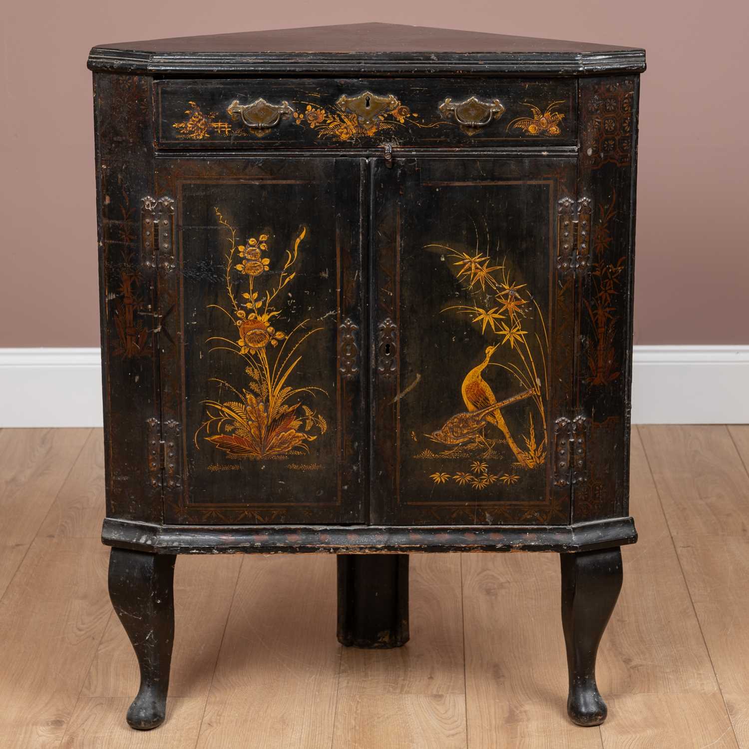 Lot 90 - A lacquered floor standing corner cupboard