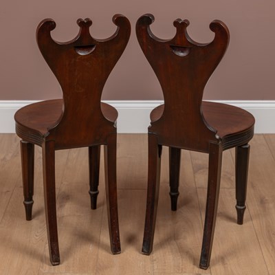 Lot 15 - A pair of Georgian mahogany hall chairs