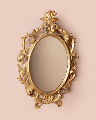 Lot 87 - A gilt oval mirror