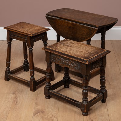 Lot 356 - Two oak framed joint stools together with a drop leaf table