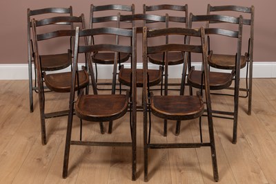 Lot 184 - A set of nine pine folding chairs