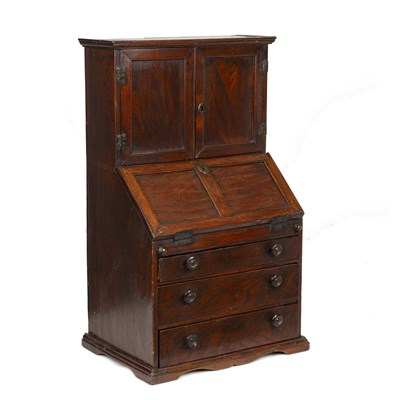 Lot 22 - An 18th century elm apprentice bureau bookcase...