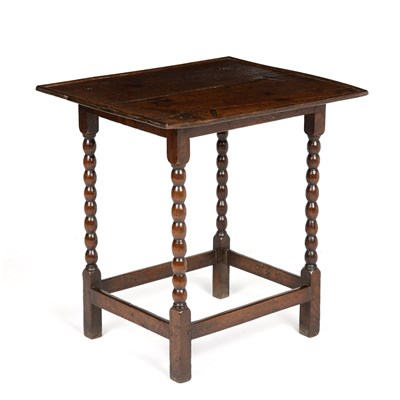 Lot 43 - A Queen Anne oak table, with turned supports...