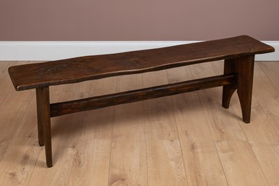 Lot 320 - A single plank elm bench