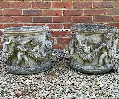 Lot 1339 - A pair of cast stone planters