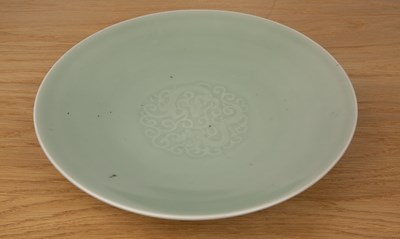 Lot 122 - Celadon dish Chinese, 18th/19th Century with a...