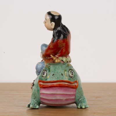 Lot 156 - Porcelain model of a boy on a toad Chinese,...