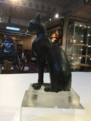 Lot 122 - An Egyptian bronze cat figure , hollow cast,...