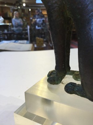 Lot 122 - An Egyptian bronze cat figure , hollow cast,...