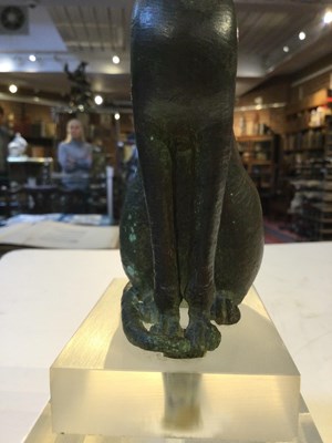 Lot 122 - An Egyptian bronze cat figure , hollow cast,...