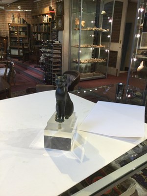 Lot 122 - An Egyptian bronze cat figure , hollow cast,...