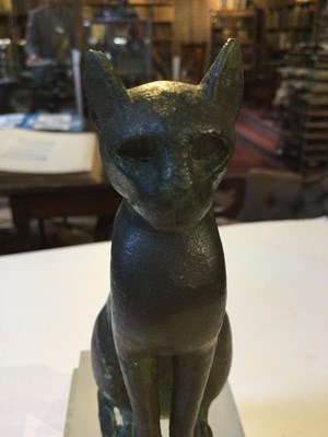 Lot 122 - An Egyptian bronze cat figure , hollow cast,...