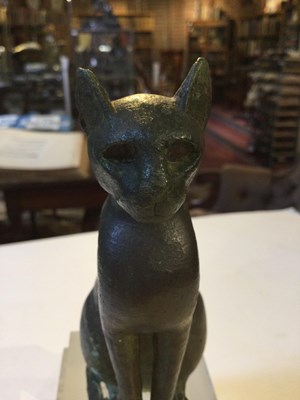 Lot 122 - An Egyptian bronze cat figure , hollow cast,...