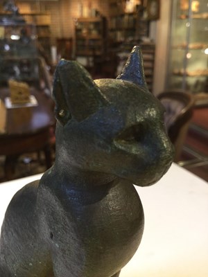 Lot 122 - An Egyptian bronze cat figure , hollow cast,...