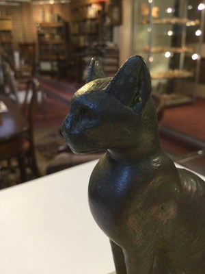 Lot 122 - An Egyptian bronze cat figure , hollow cast,...