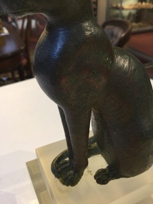 Lot 122 - An Egyptian bronze cat figure , hollow cast,...