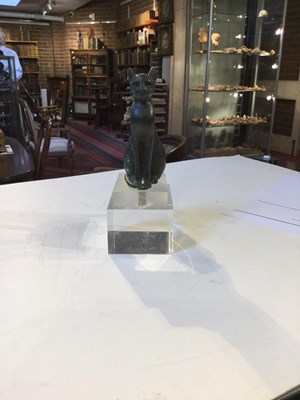 Lot 122 - An Egyptian bronze cat figure , hollow cast,...