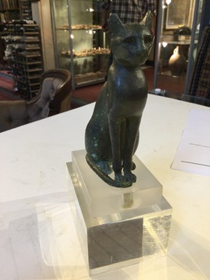 Lot 122 - An Egyptian bronze cat figure , hollow cast,...