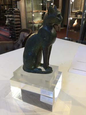 Lot 122 - An Egyptian bronze cat figure , hollow cast,...