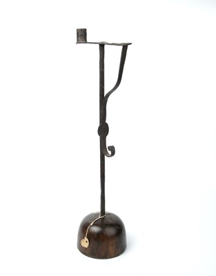 Lot 56 - An 18th century wrought iron rush light with a...
